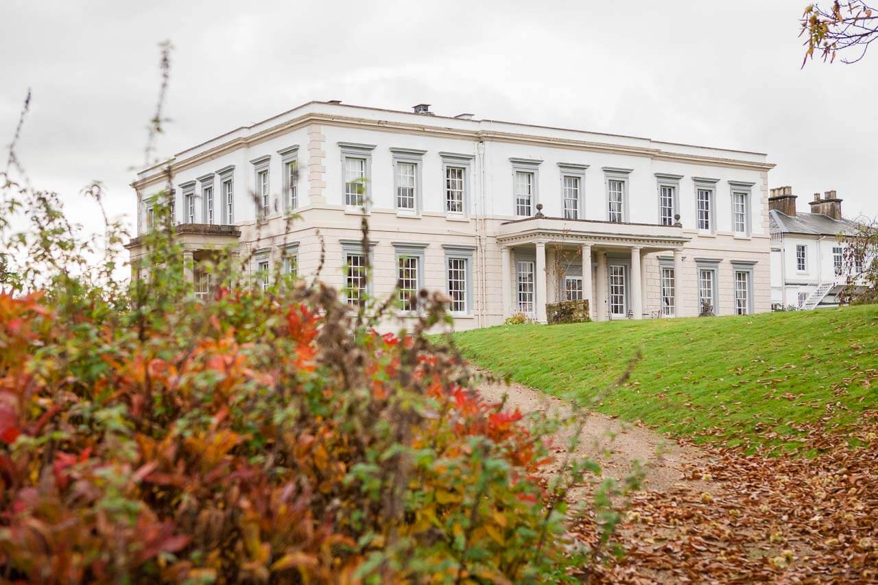busted park hotel with autumnal bushes in foreground