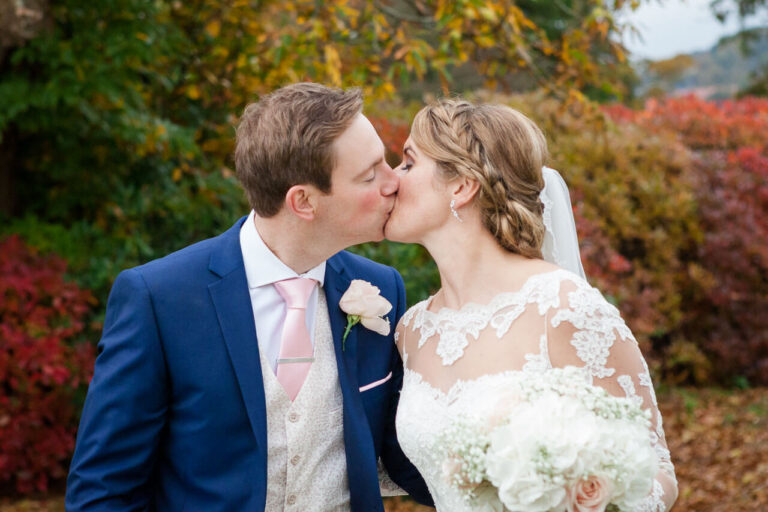 bride and groom kissing