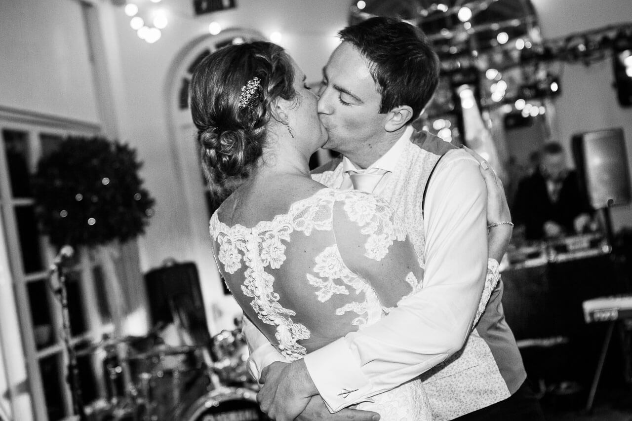 bride and groom kissing