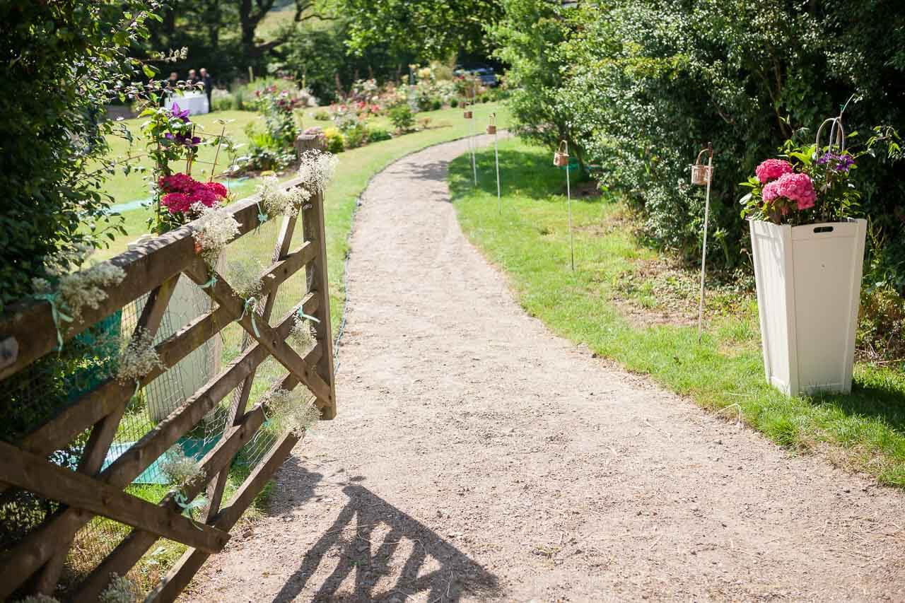 gate opening up into lovely garden reception