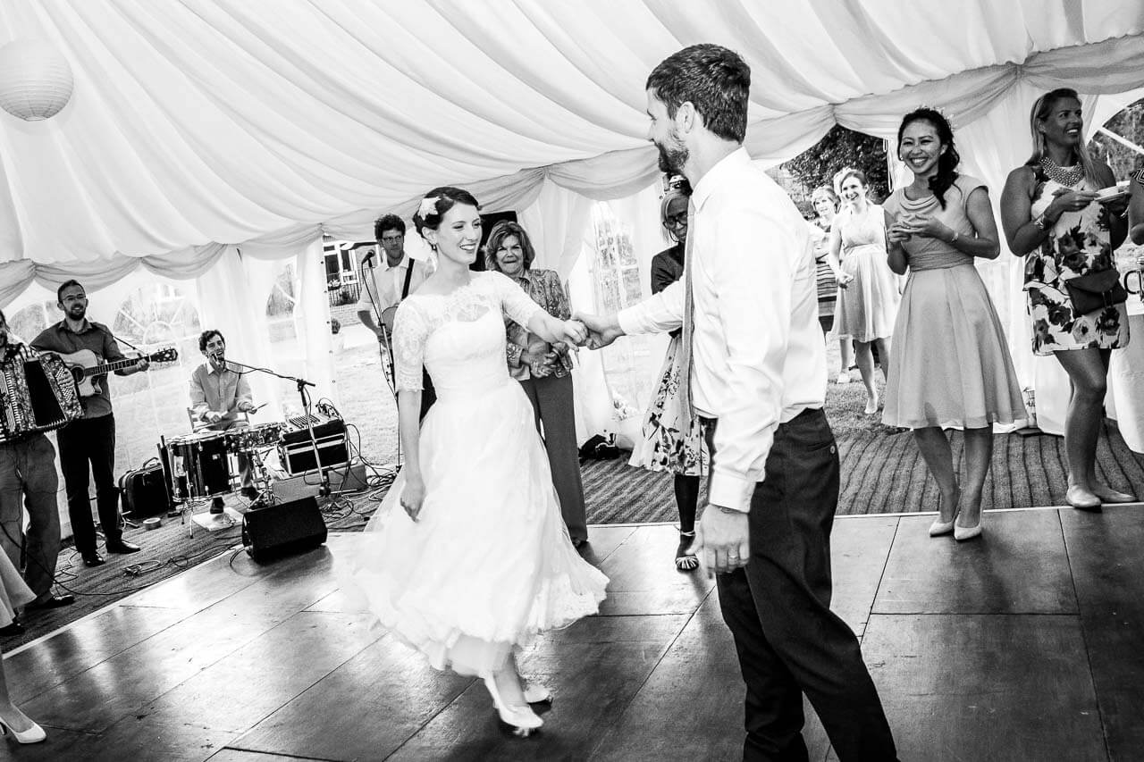 bride and groom doing first dance