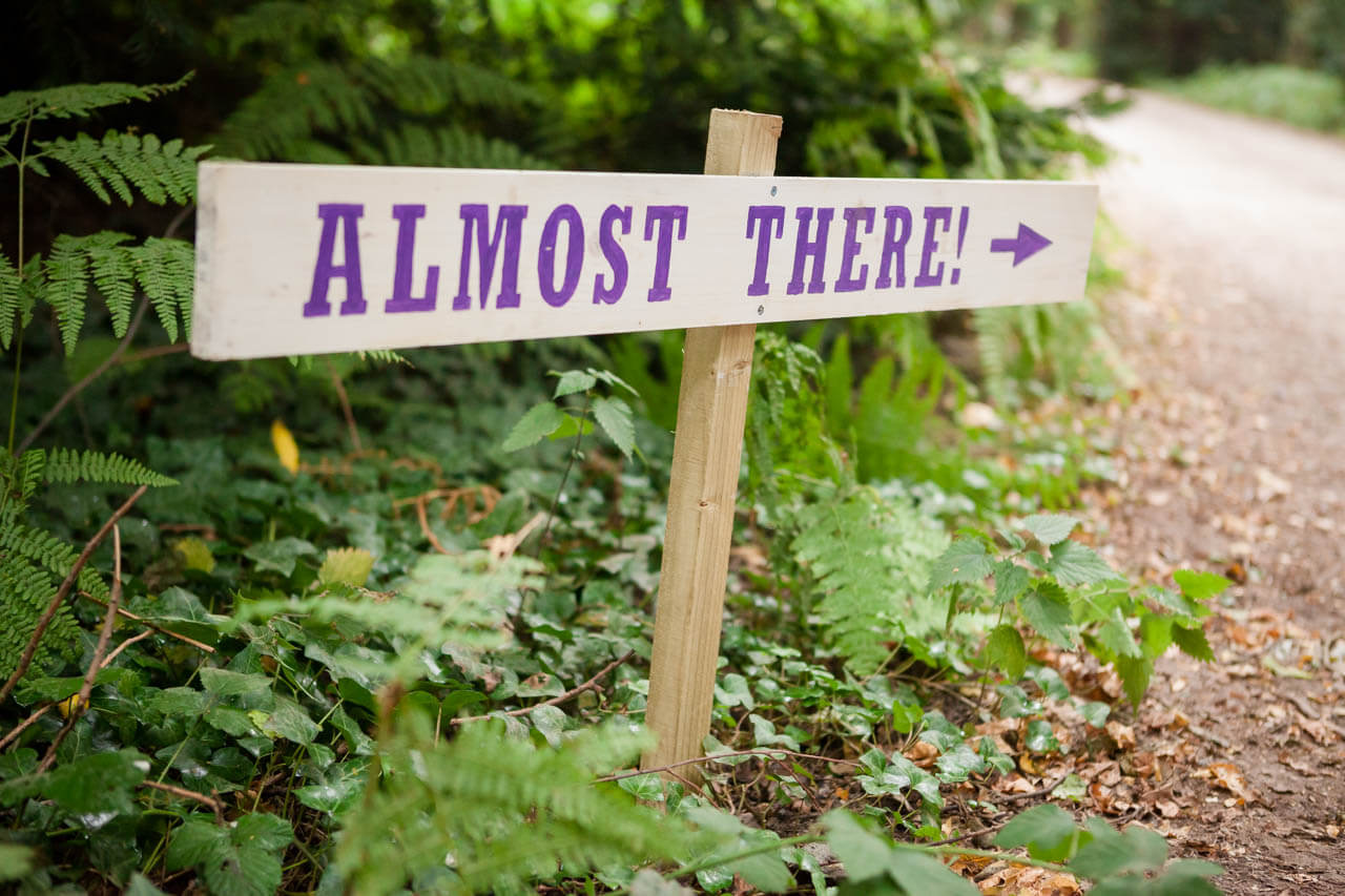 direction to wedding saying 'almost there'