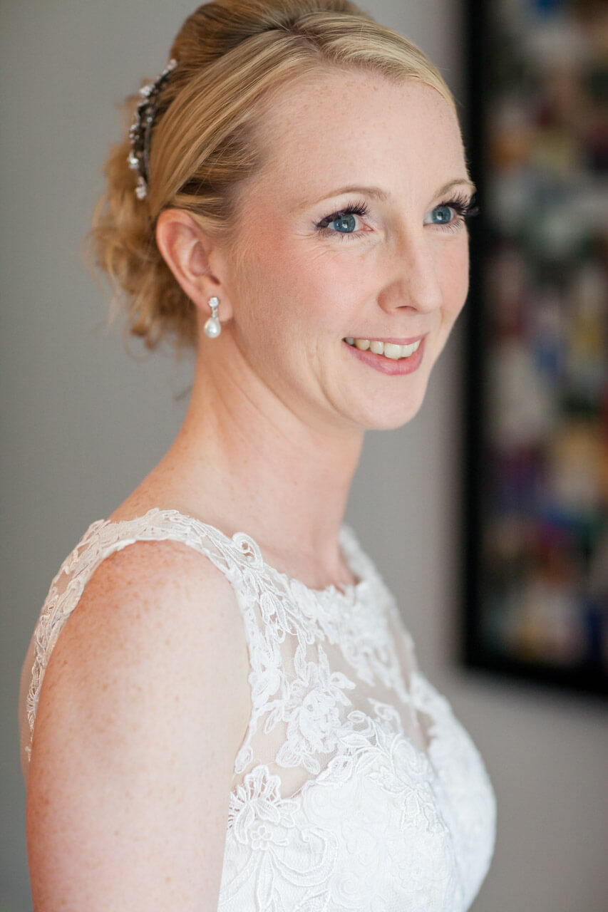 bride smiling looking to the side away from the camera