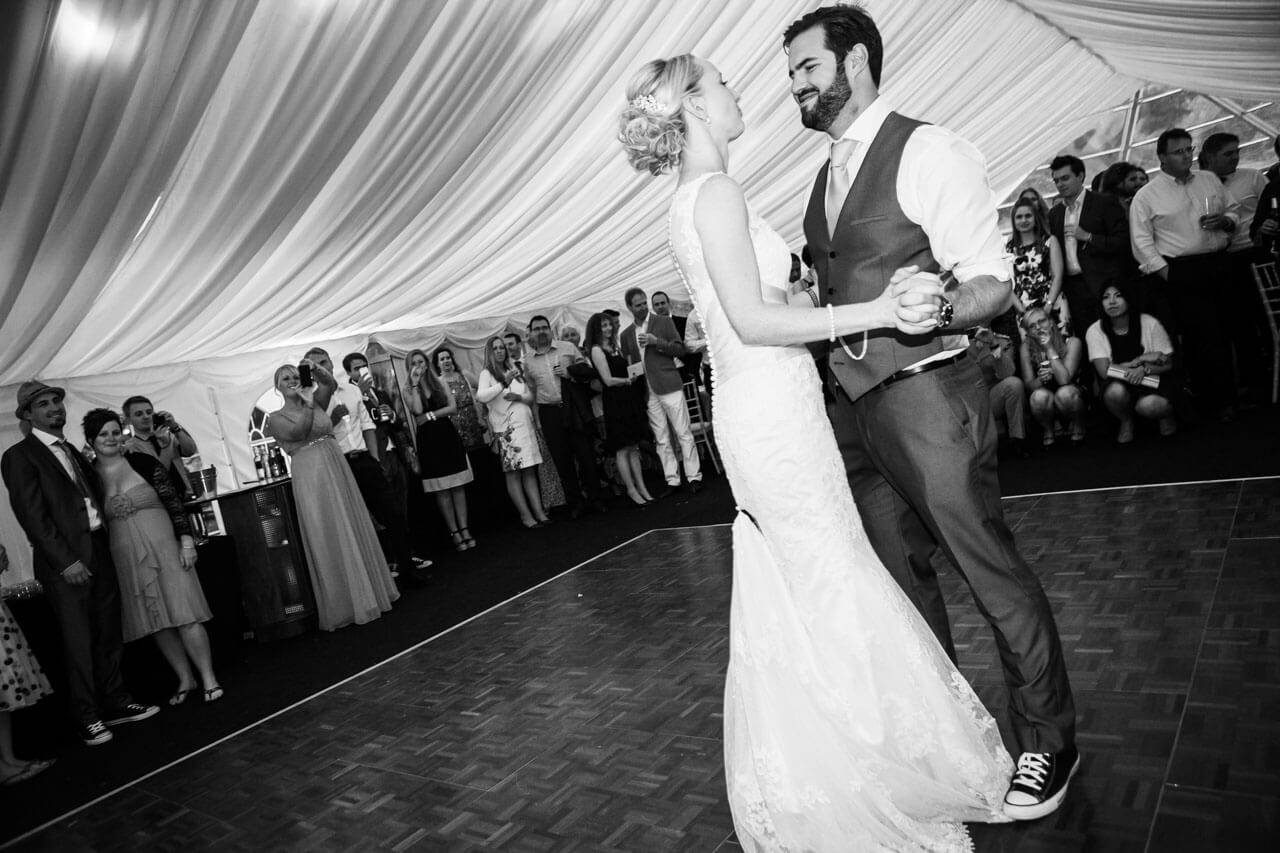 full length shot of bride and groom doing first dance