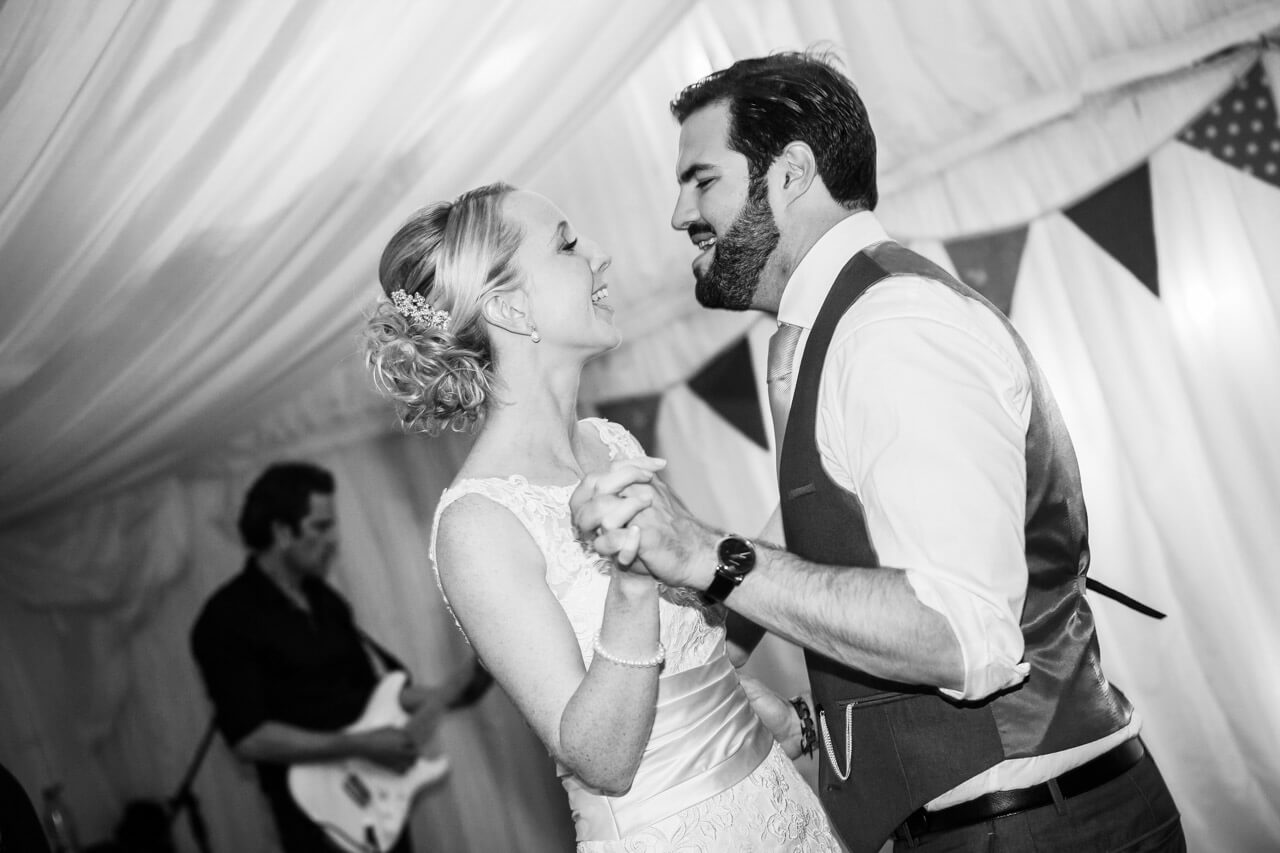close up of bride and groom doing first dance