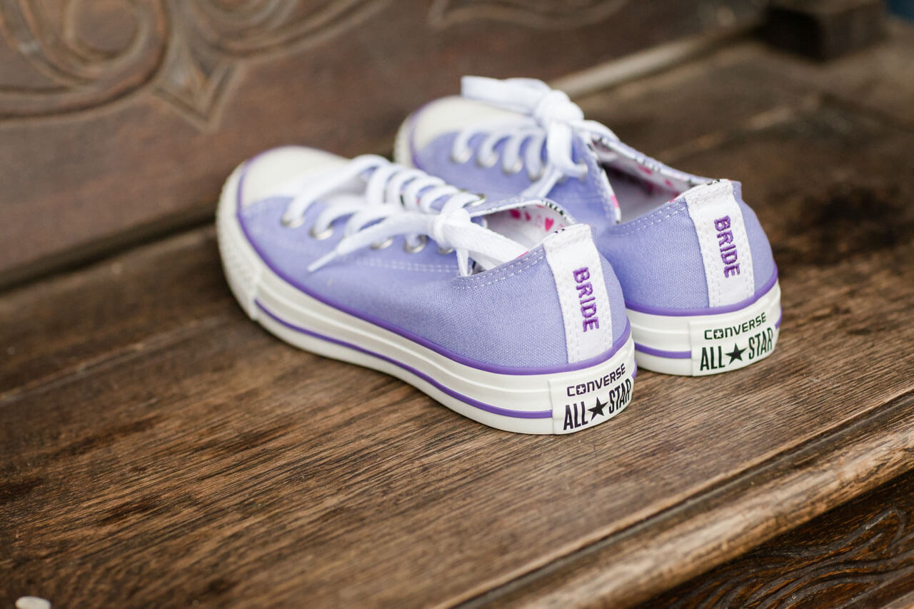 bride's purple converse trainers reading bride