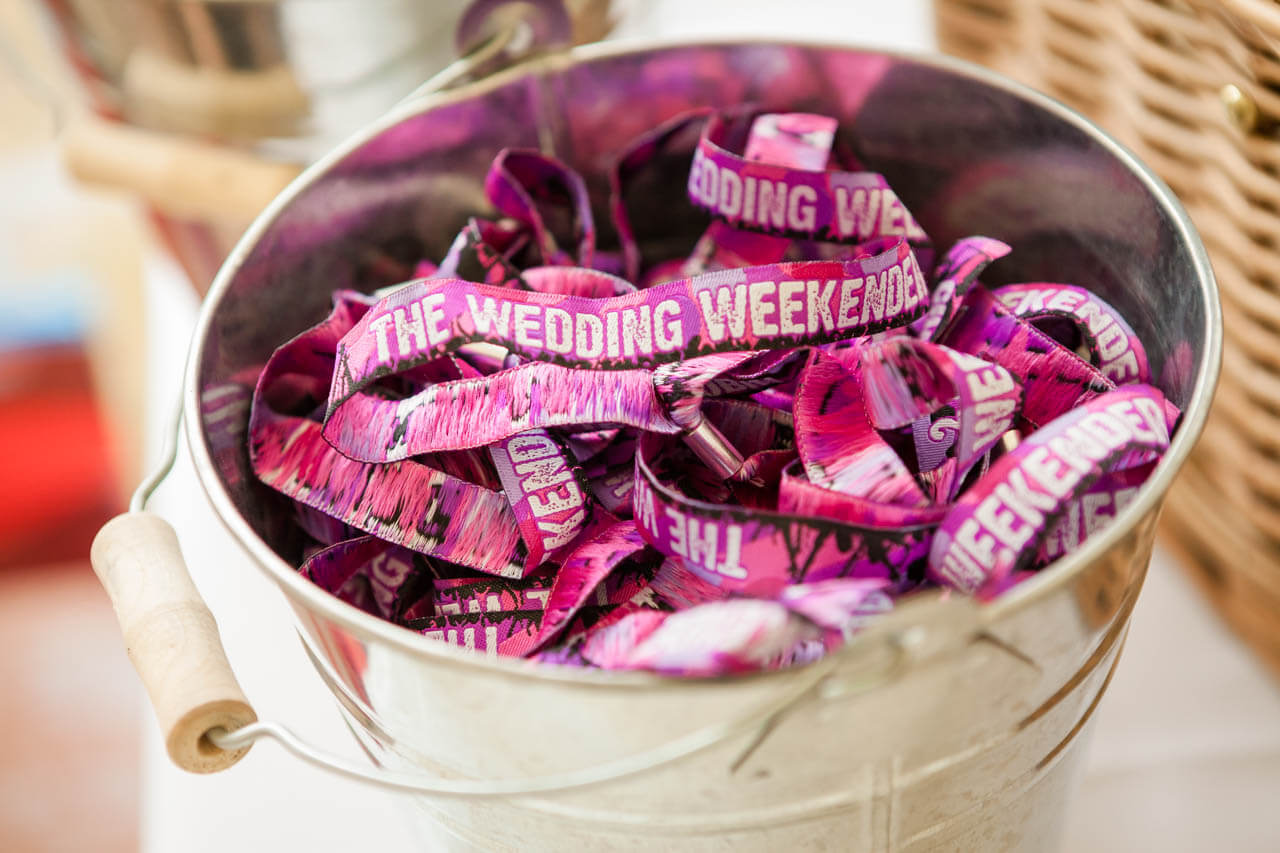 basket of wrist bands for wedding guests