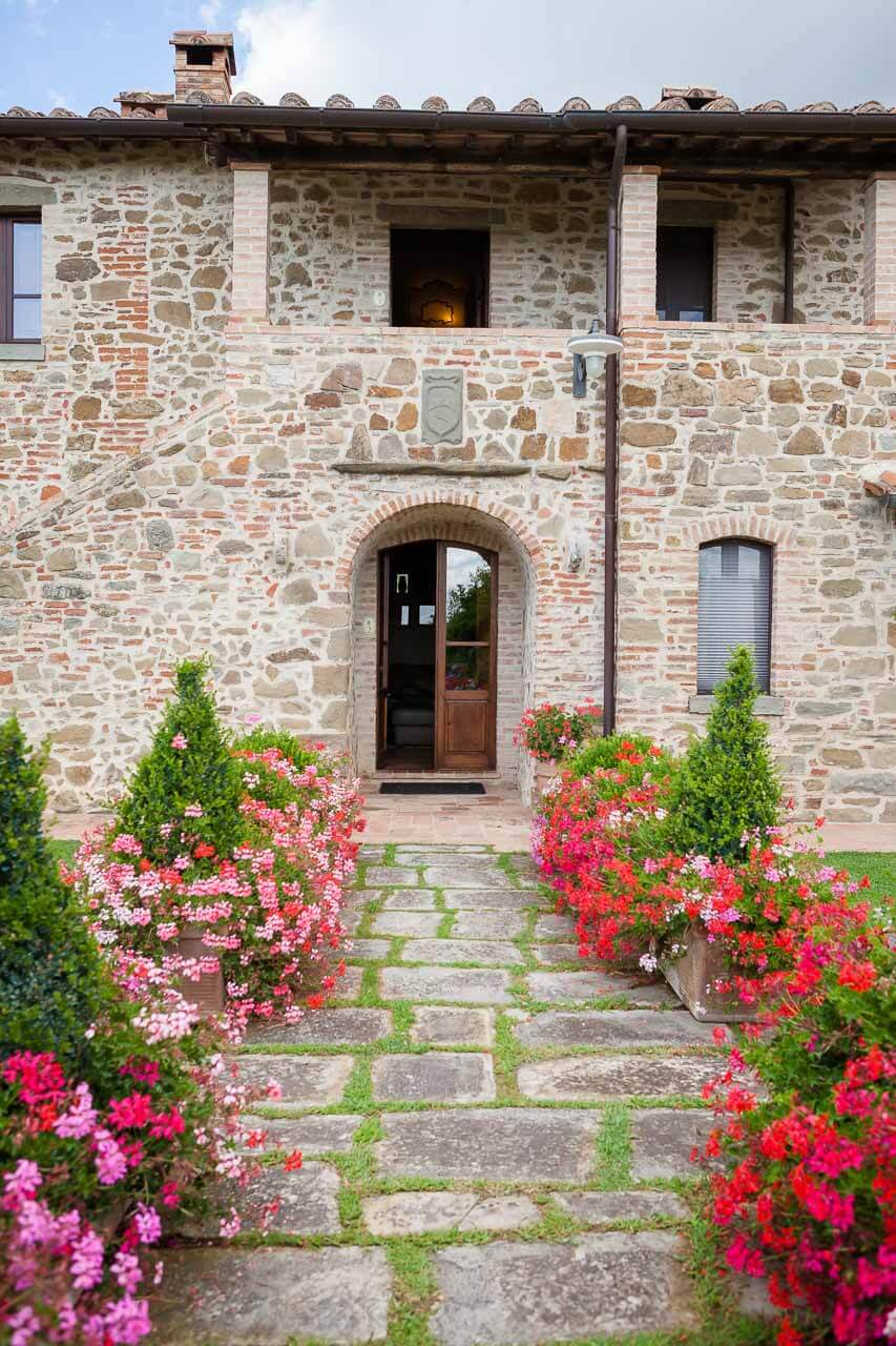 path leading up to front door of the villa