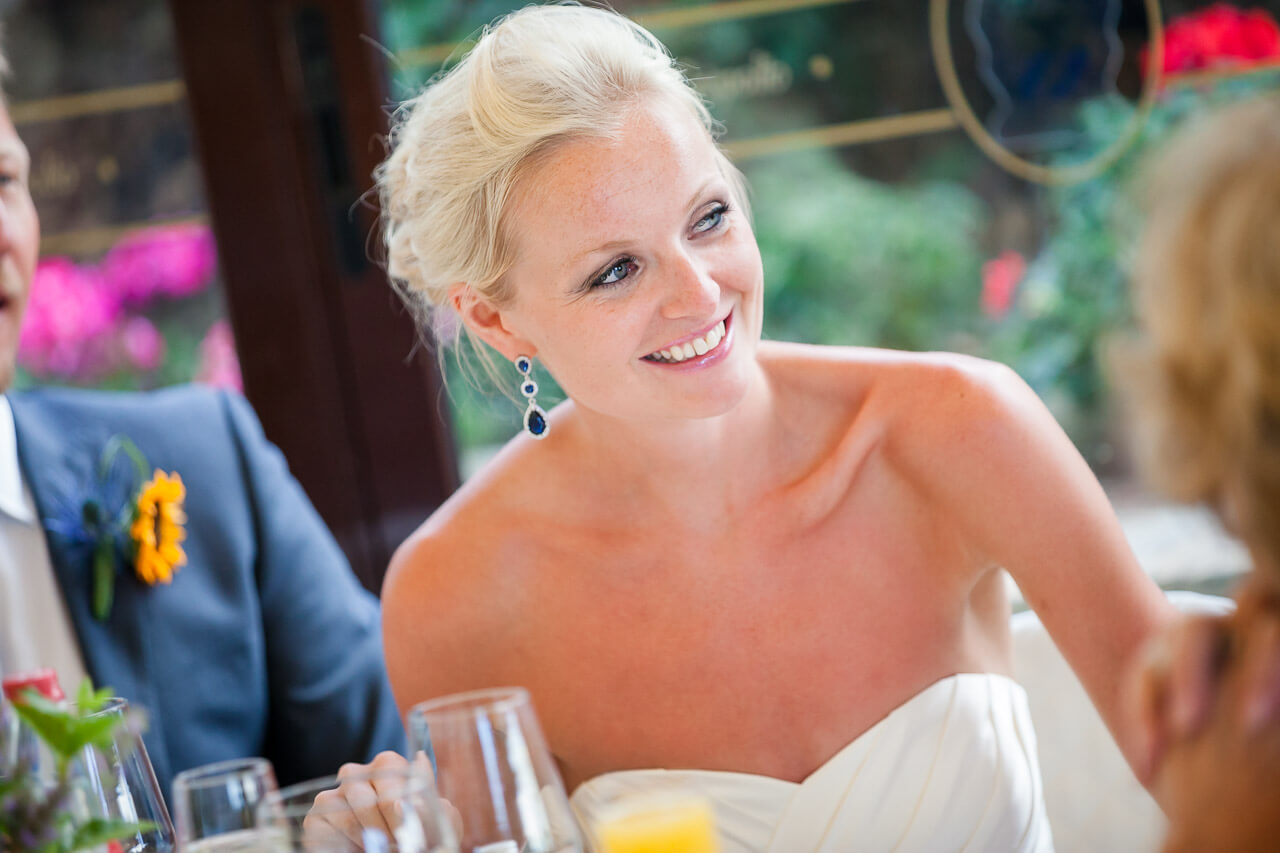 bride smiling listening to speech
