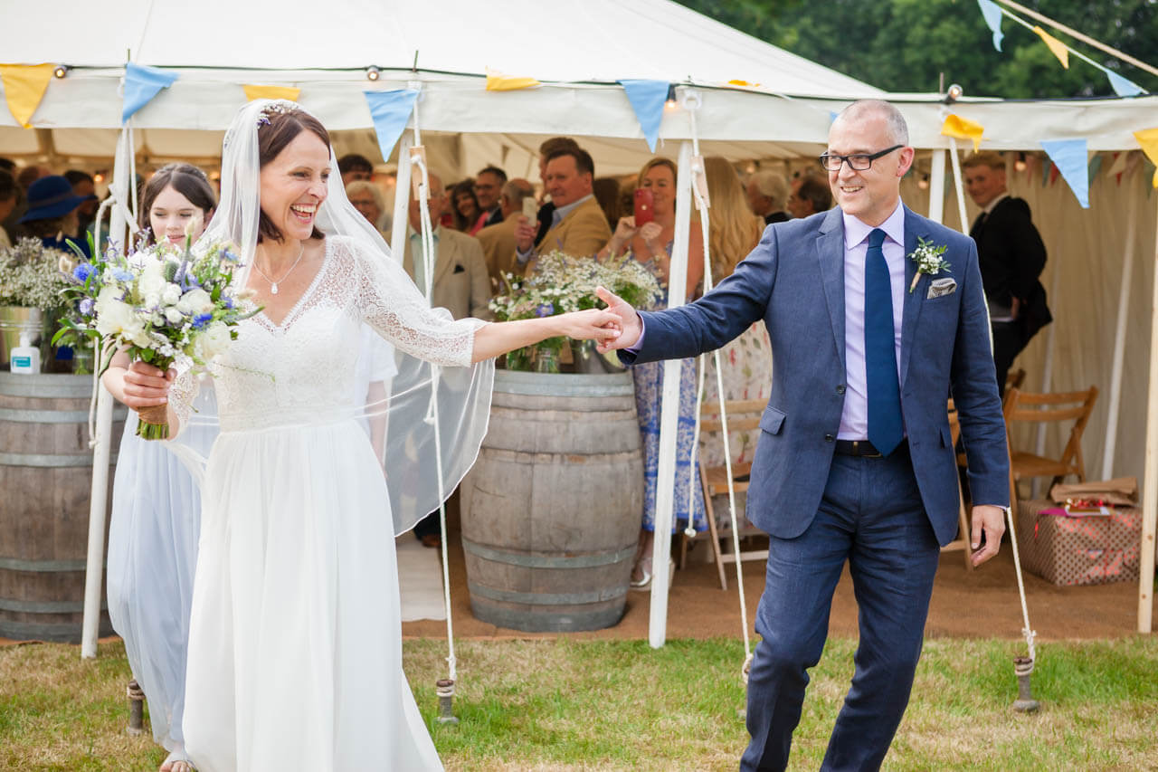 bride and groom celebrating with a dance after getting married