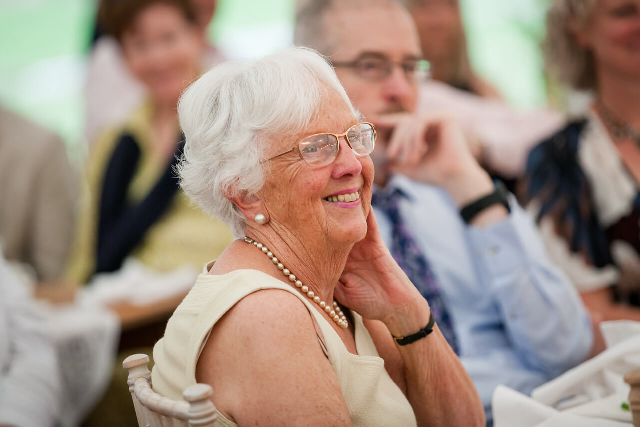 mother of the bride smiling at speech