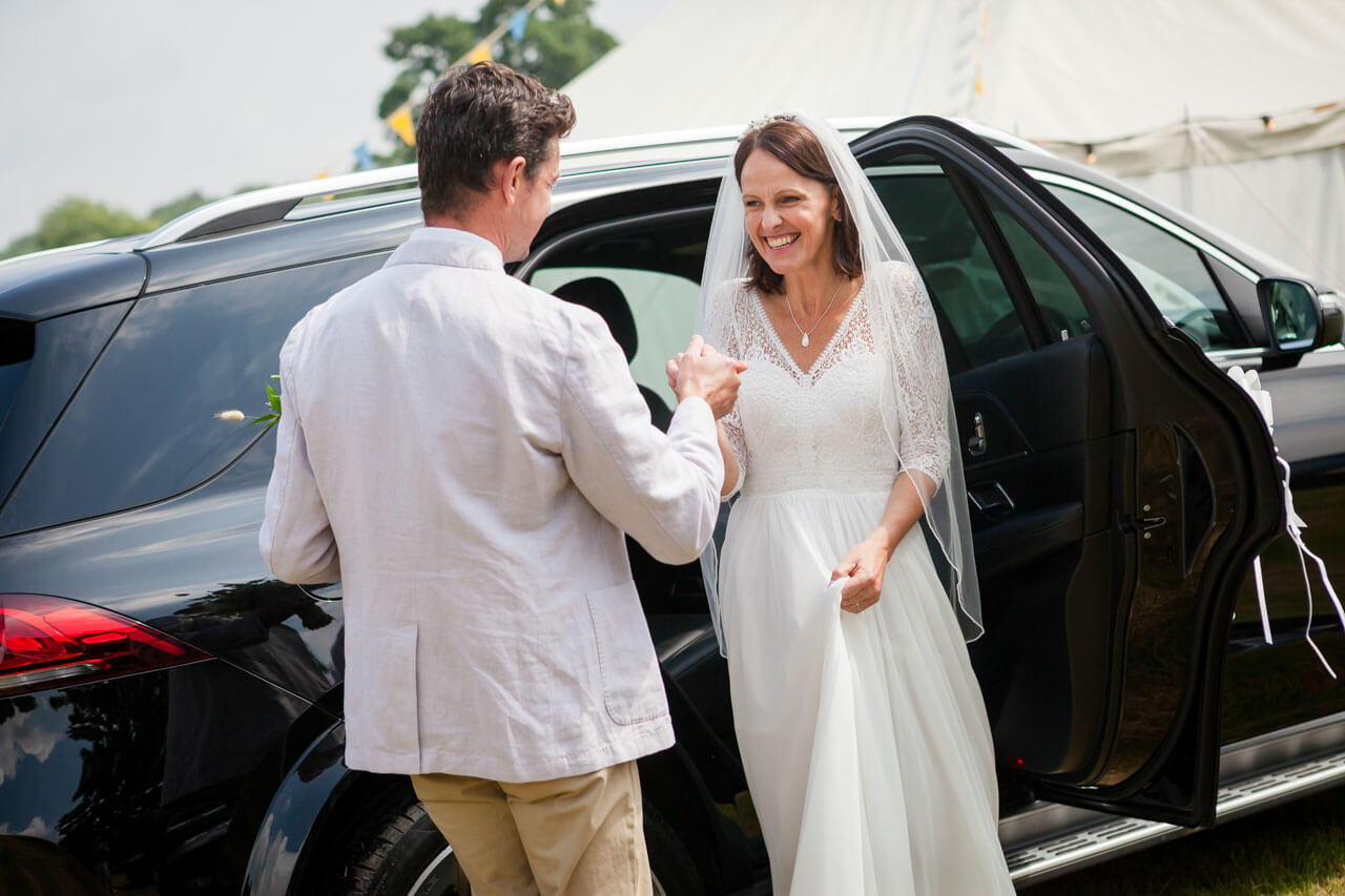 bride is greeted by her brother