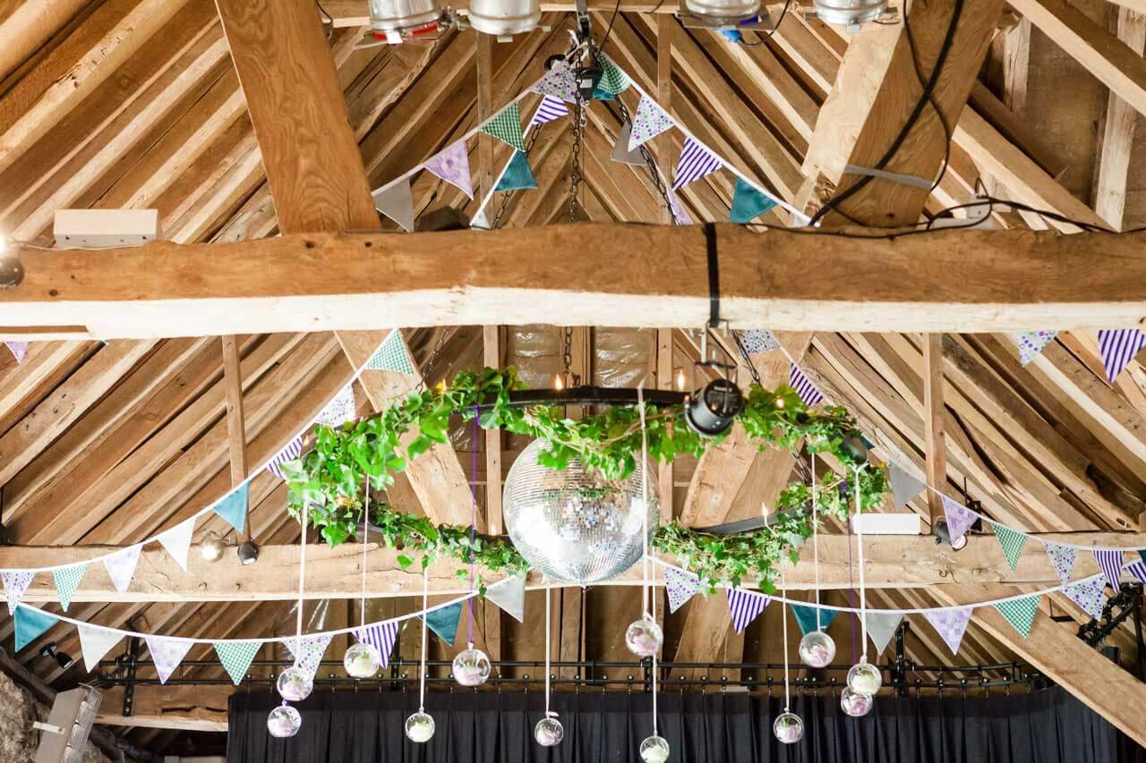 rafters with decorations hanging off them