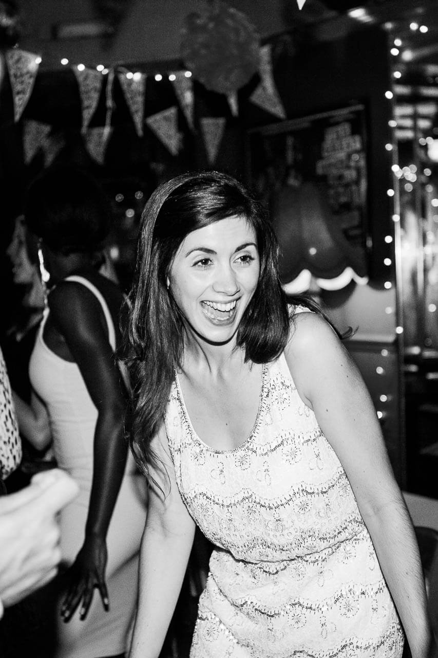 bride laughing on floor