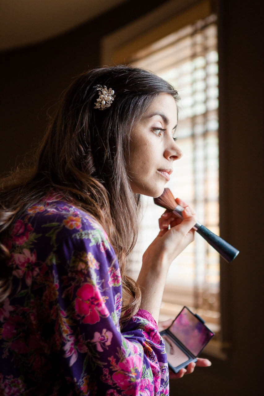 bride putting on make up