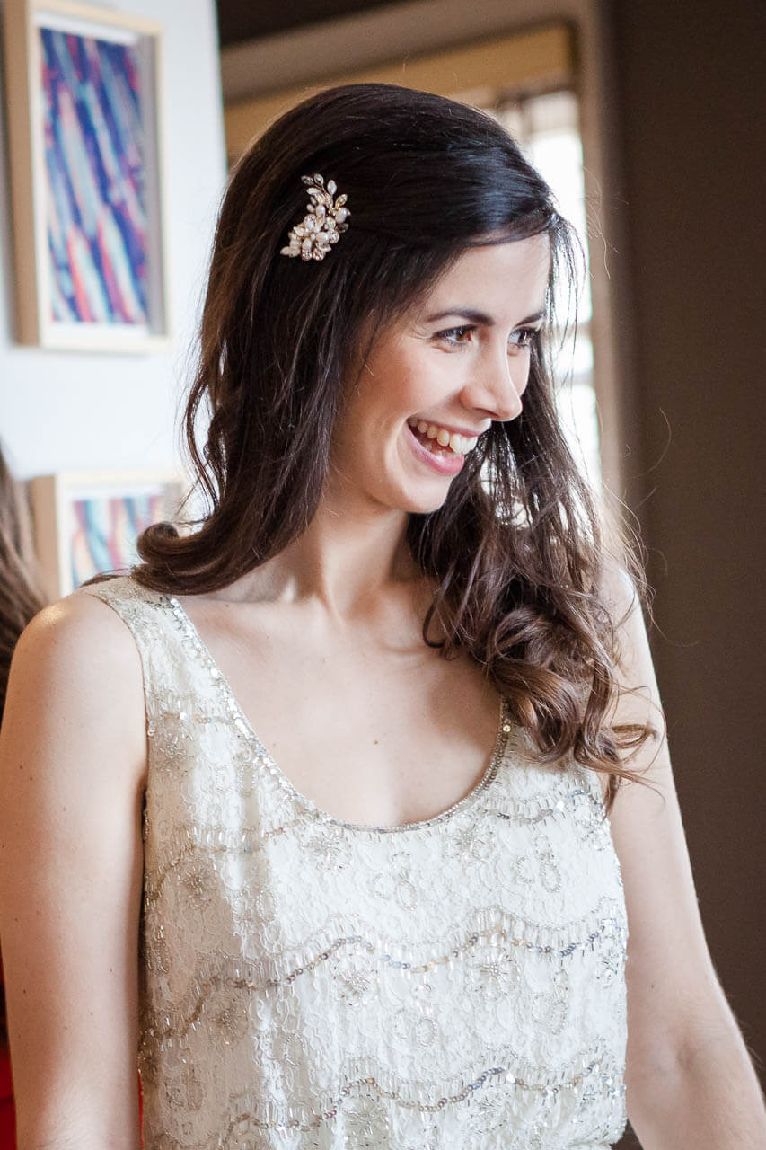 bride laughing looking out of the window