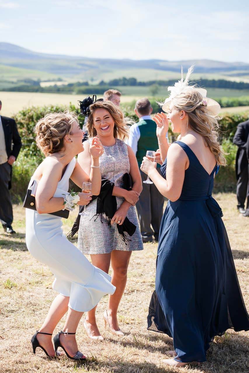 guests chatting and laughing