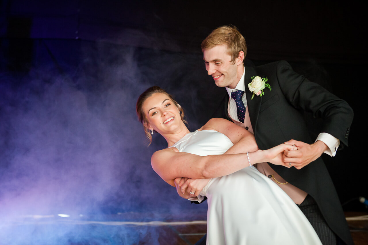 bride and groom dancing