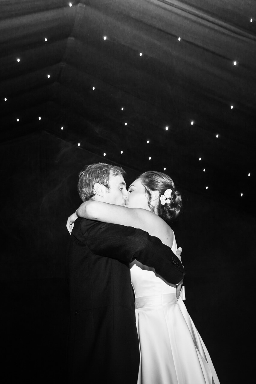 bride and groom kissing