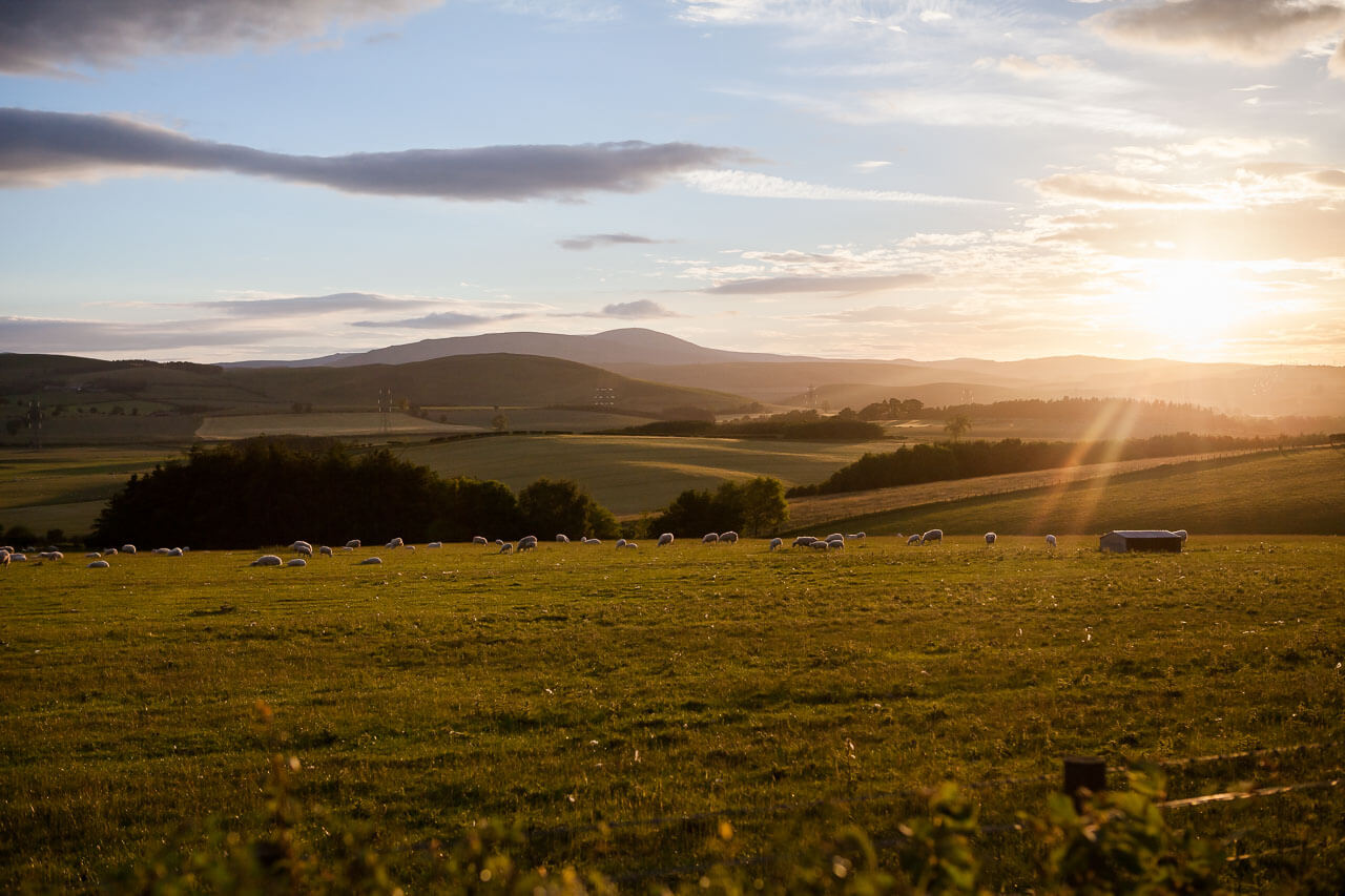 sunset over northumberland landscape