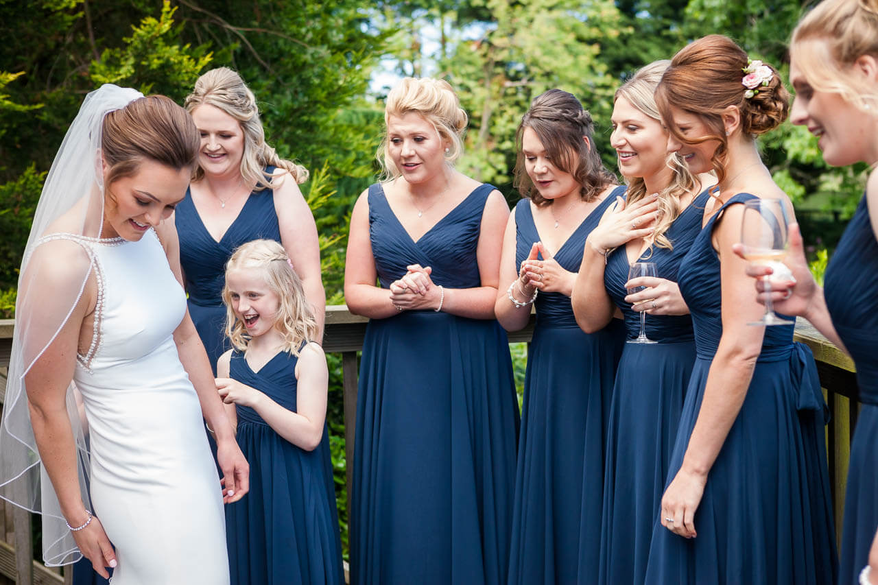 bride and bridal party chatting
