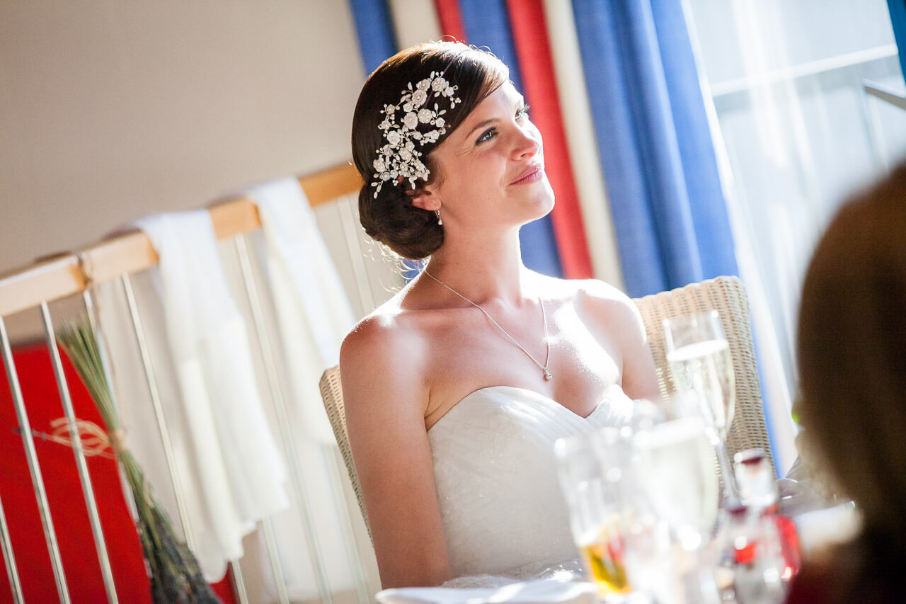teary bride listens to speech