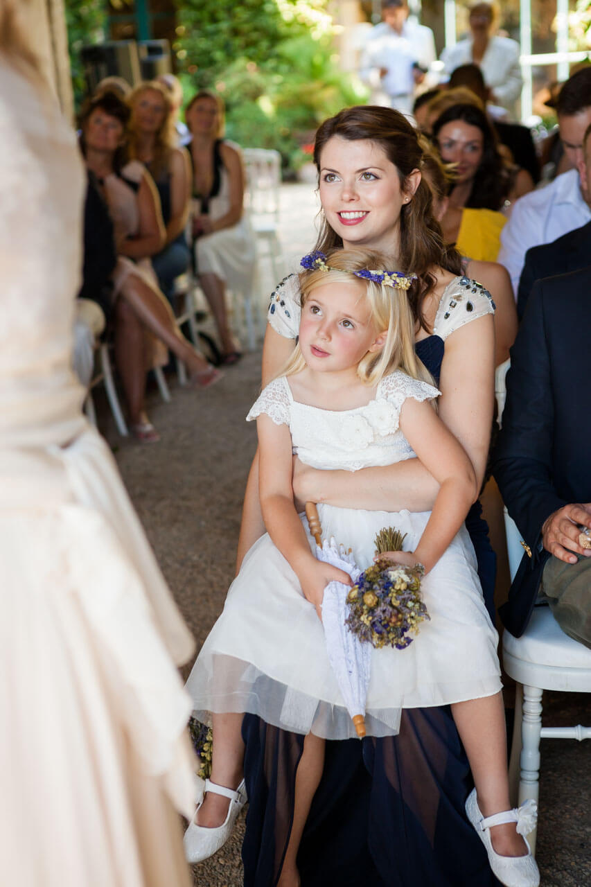 bridesmaids watching bride and groom