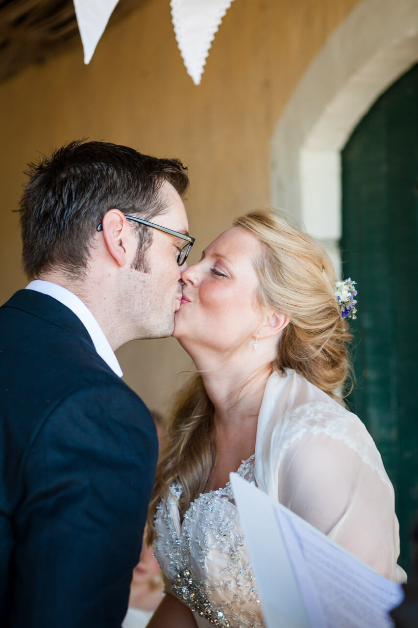 bride and groom kissing