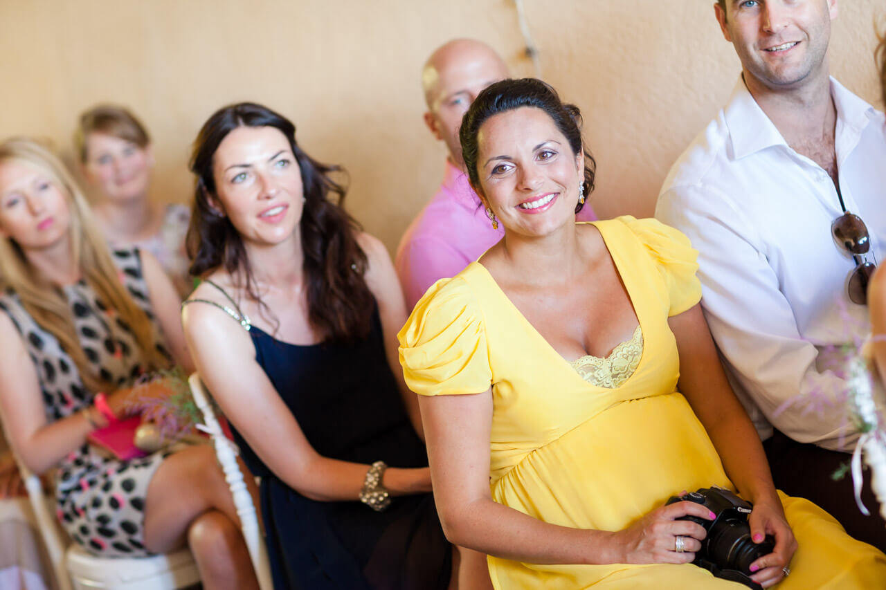 wedding guest smiling