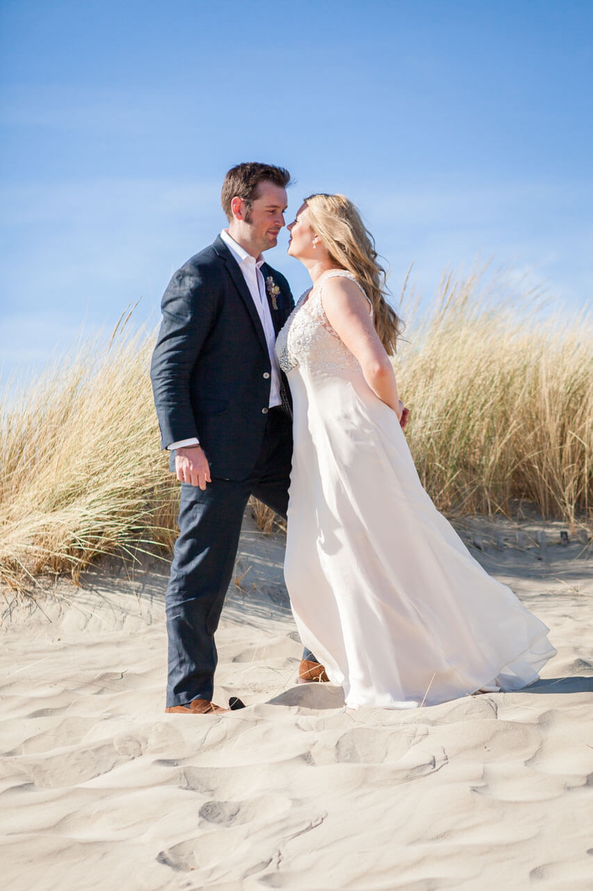 bride and groom on beach