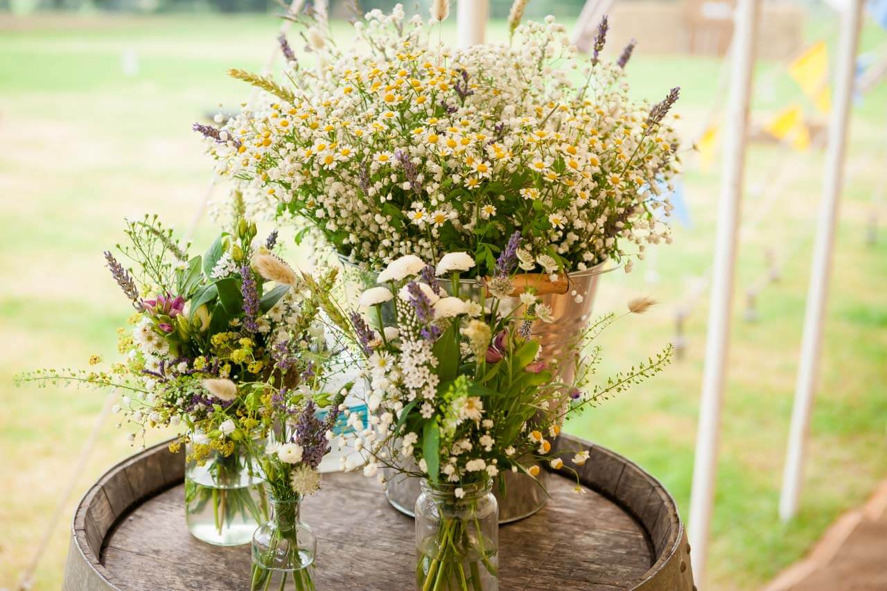 flower decorations inside marquee