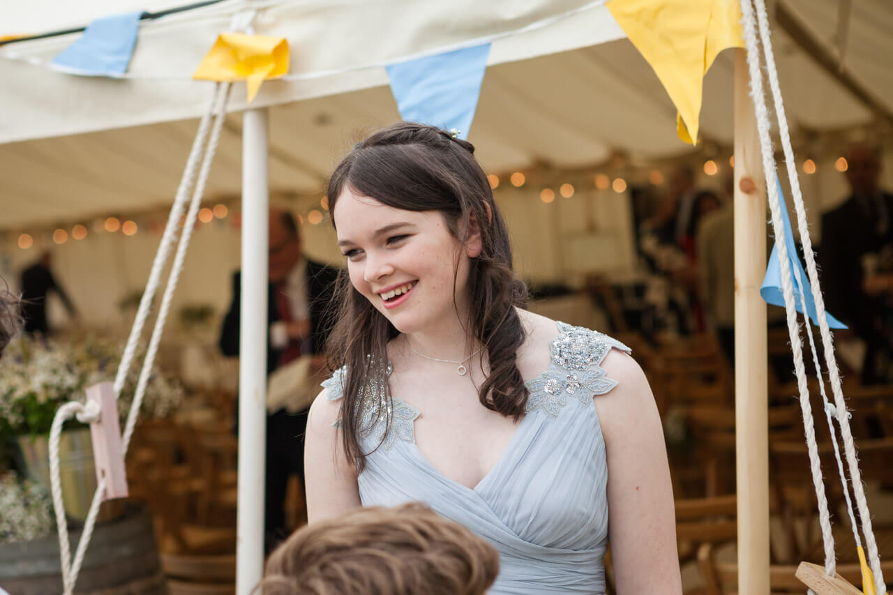 bridesmaid smiling with friend