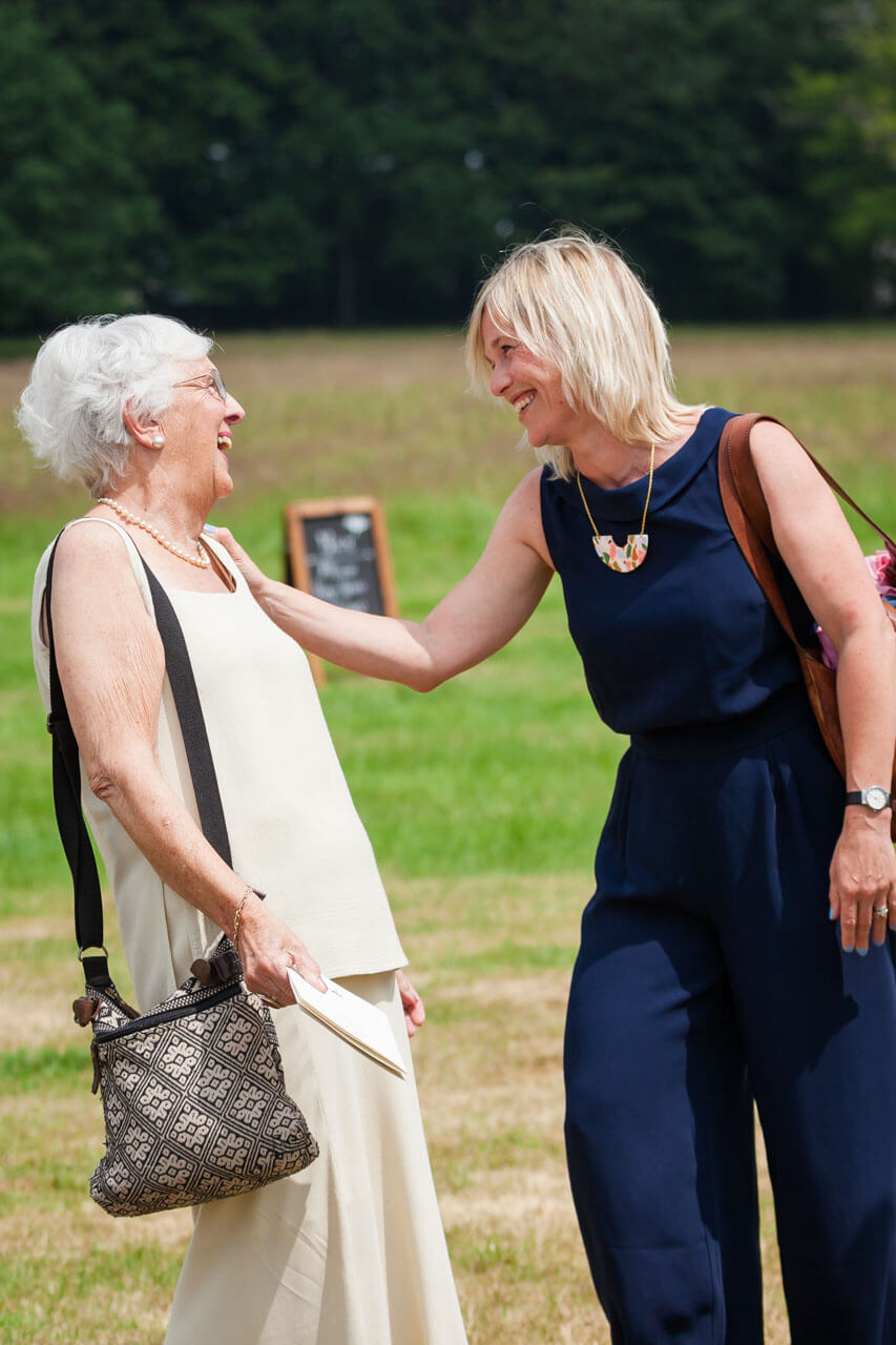 guests greet each other with delight