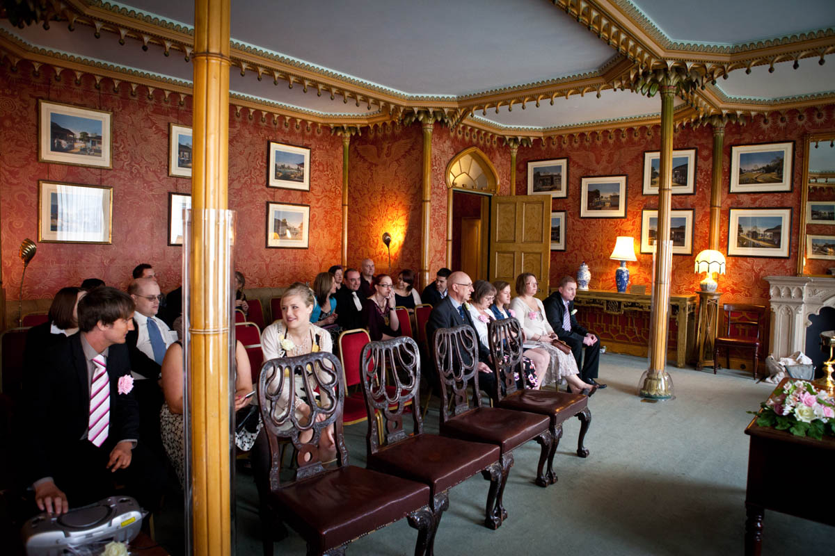 wedding ceremony taking place inside Royal Pavilion