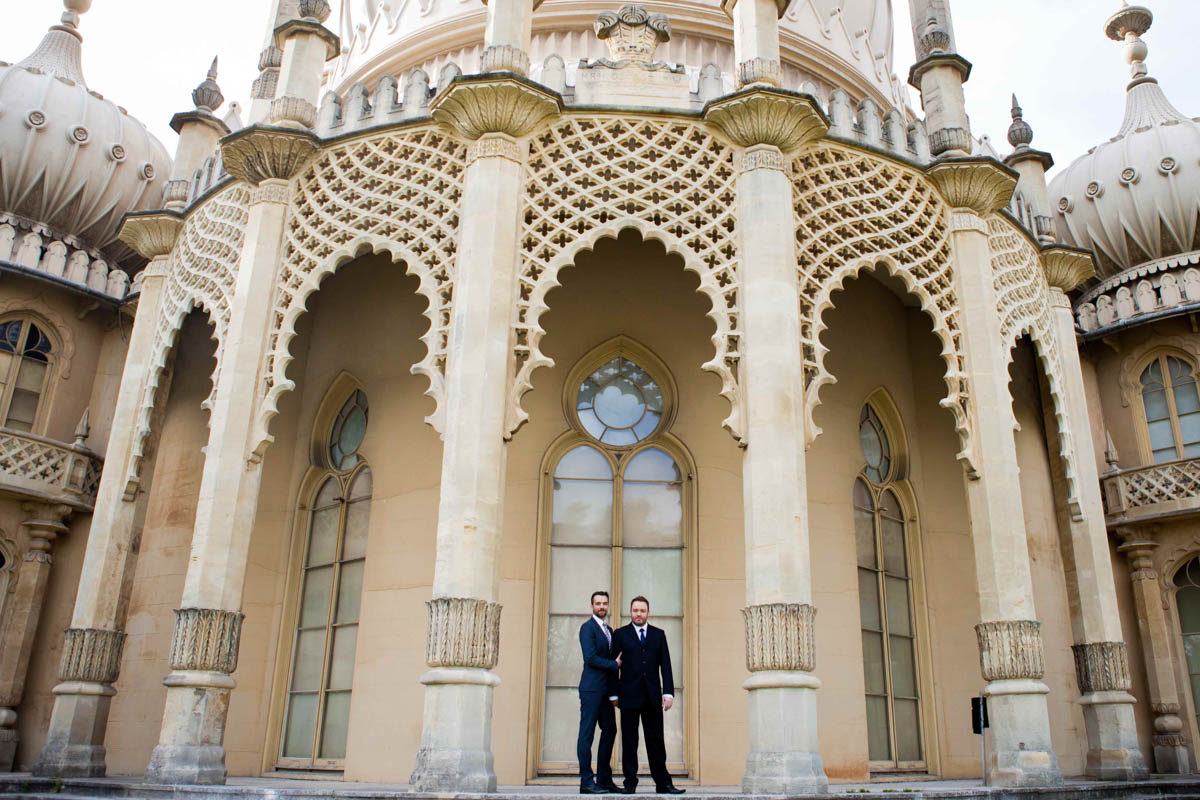 groom and groom standing outside royal pavilion