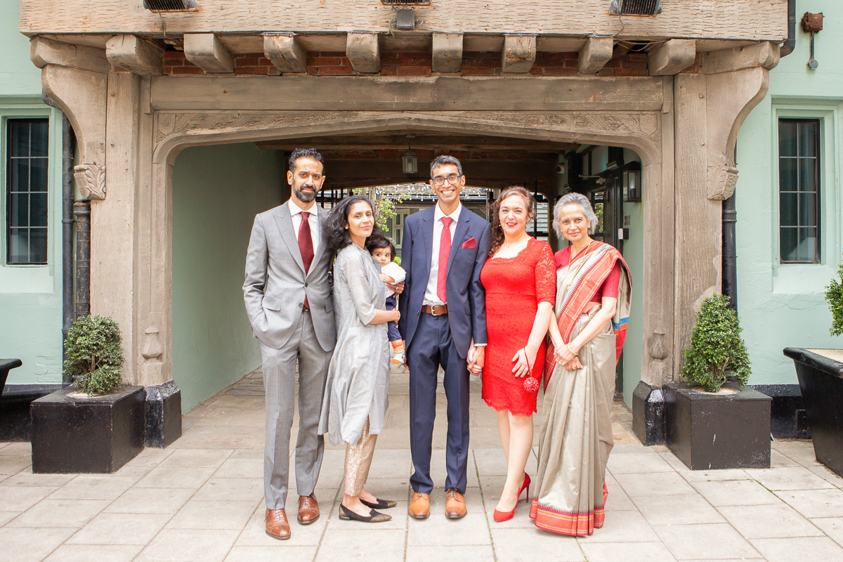 wedding party standing outside hotel du vin