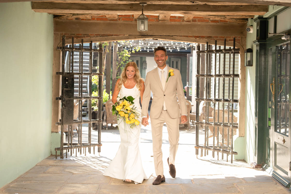 bride and groom exiting the Hotel du Vin