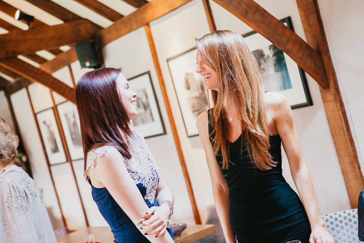 two guests chatting