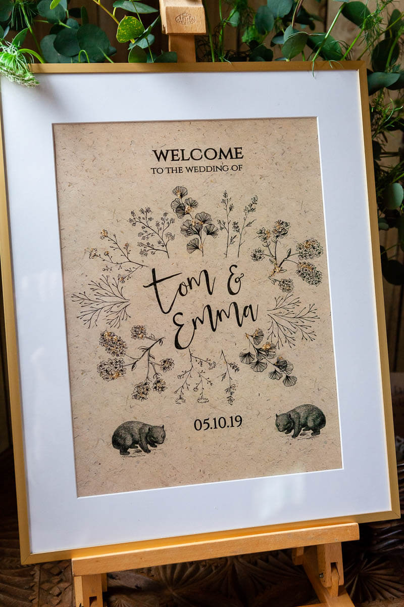 welcome board saying tom and Emma and the date of their wedding
