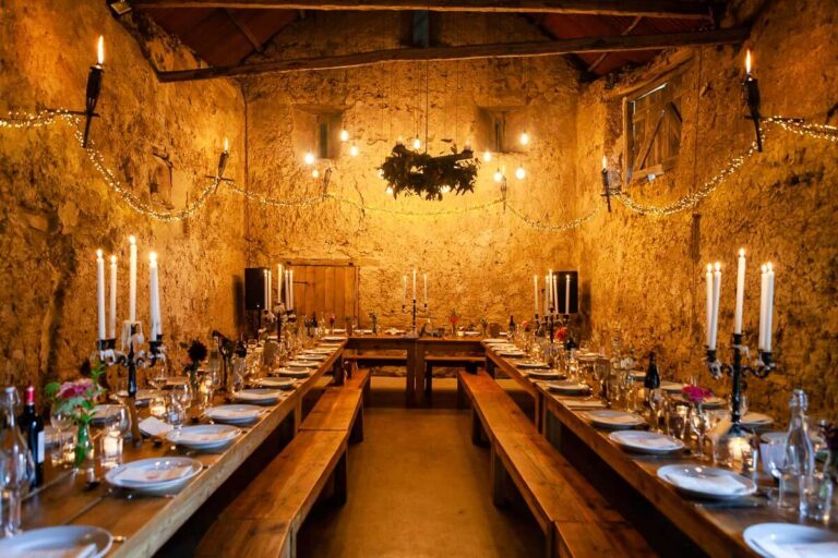 photo of stone barn set up for the wedding dinner