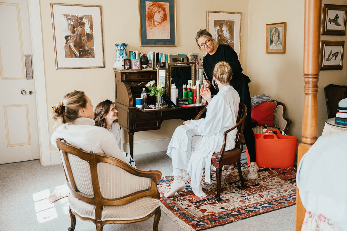 bridal party in morning getting ready bedroom