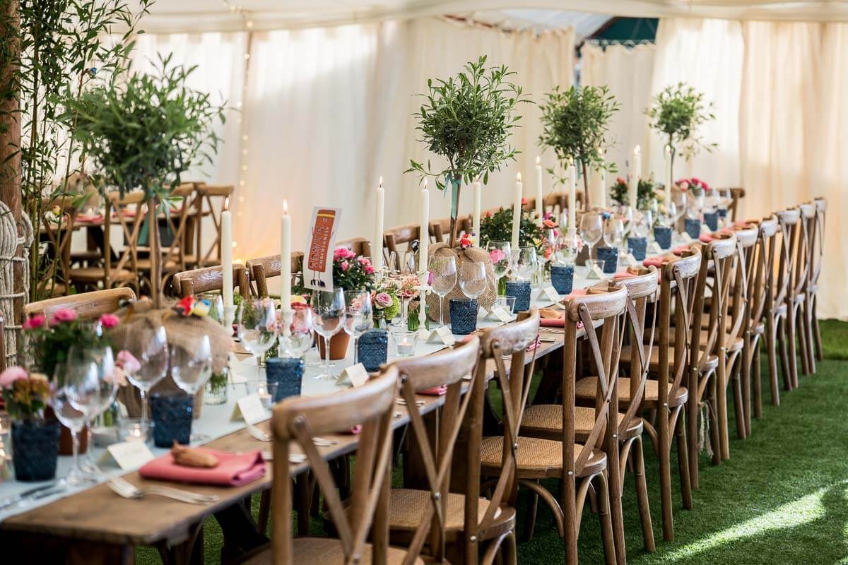 stunning tables set up in marquee for wedding