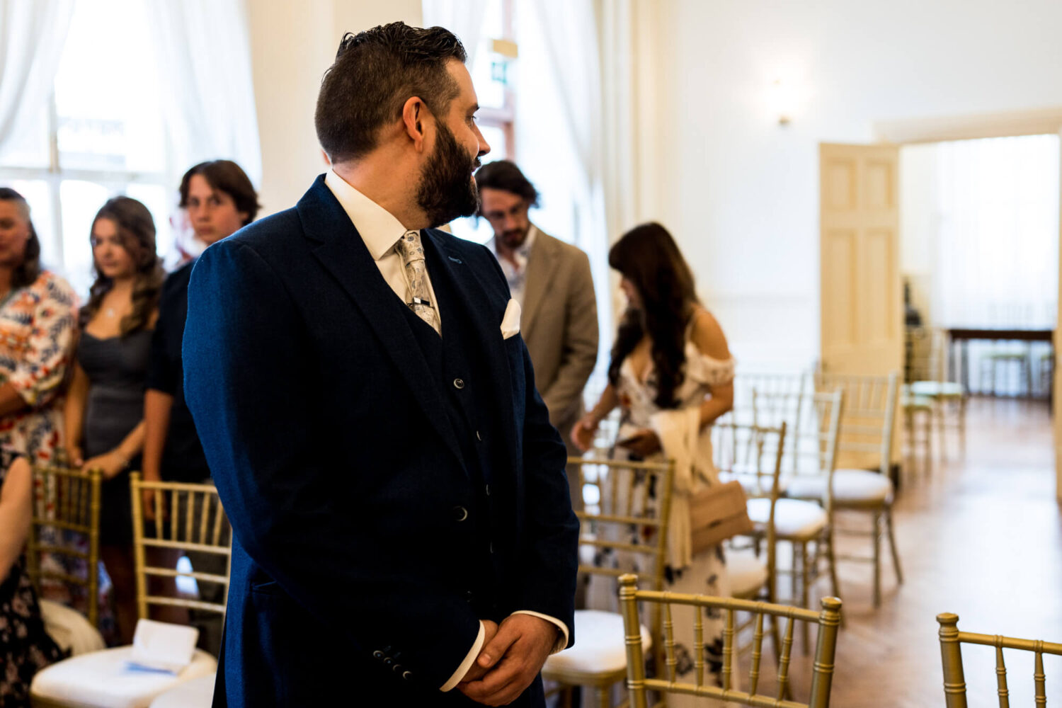 groom turning around waiting for bride to walk towards him