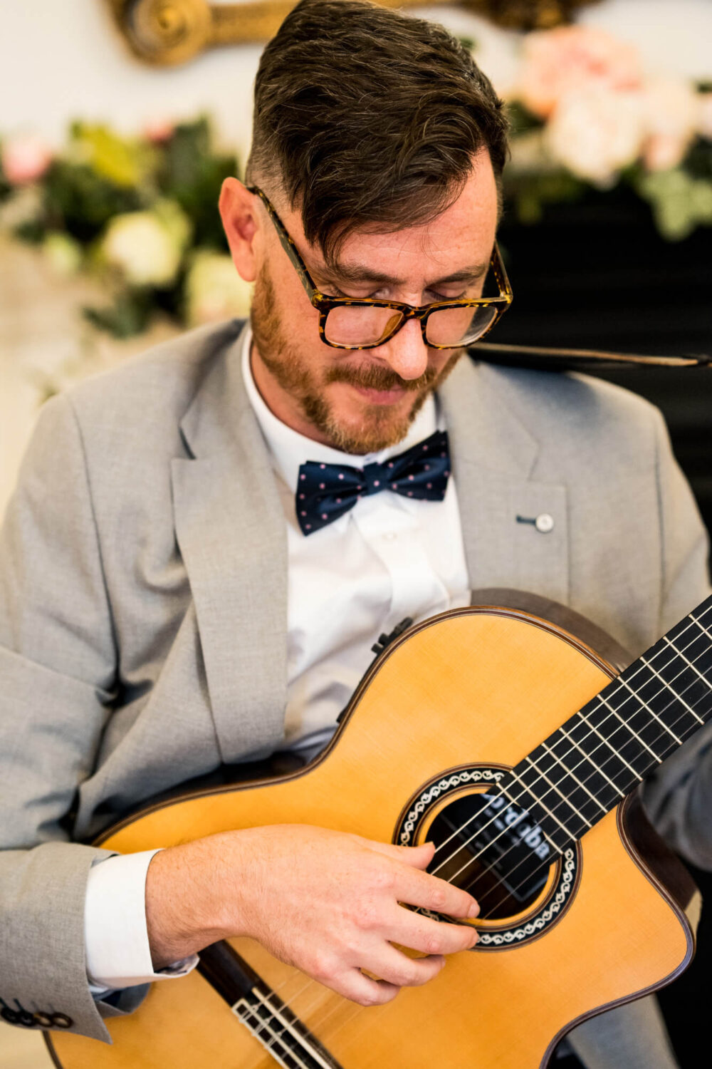 man playing a guitar