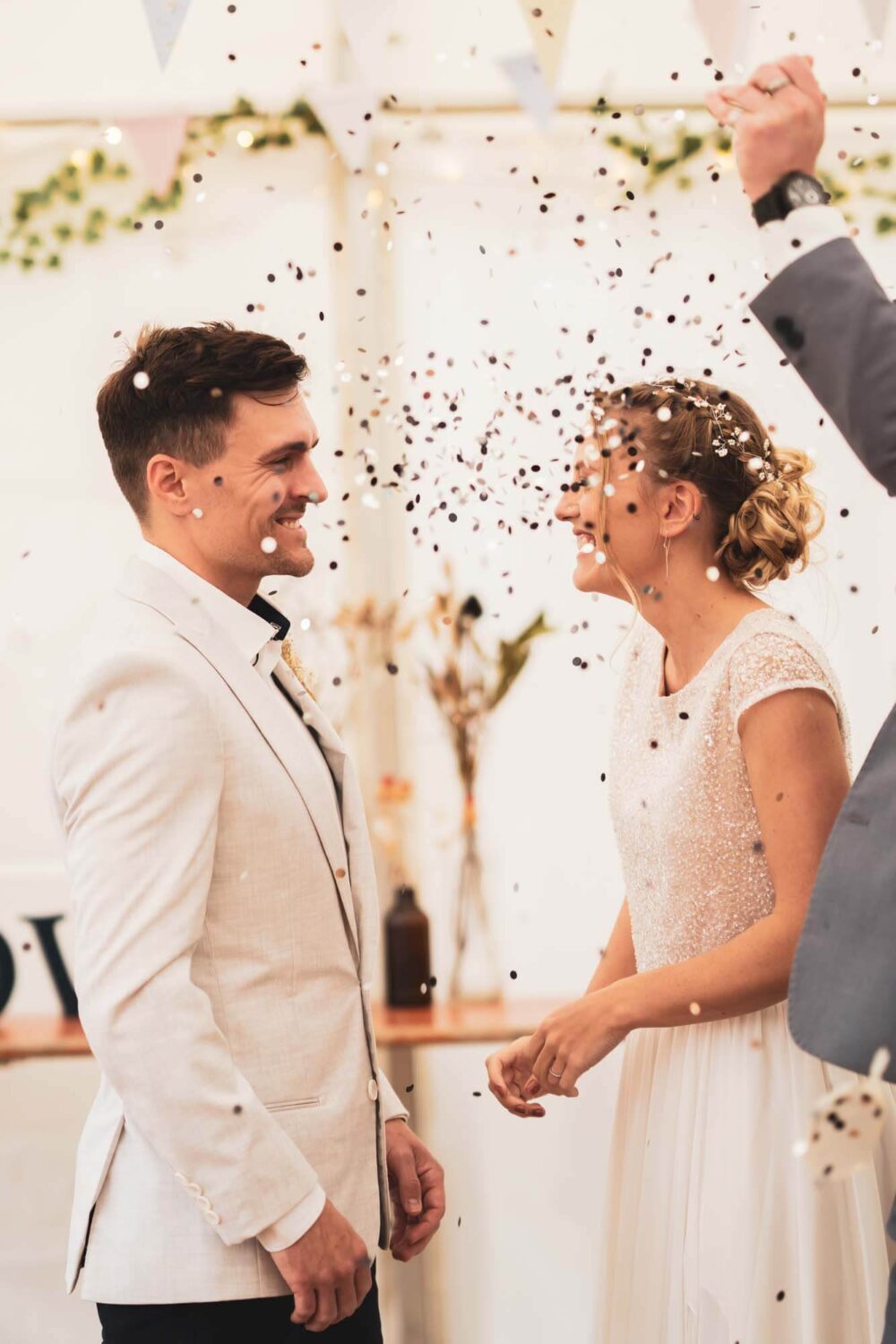 conefetti bomb on couple as they say I do's