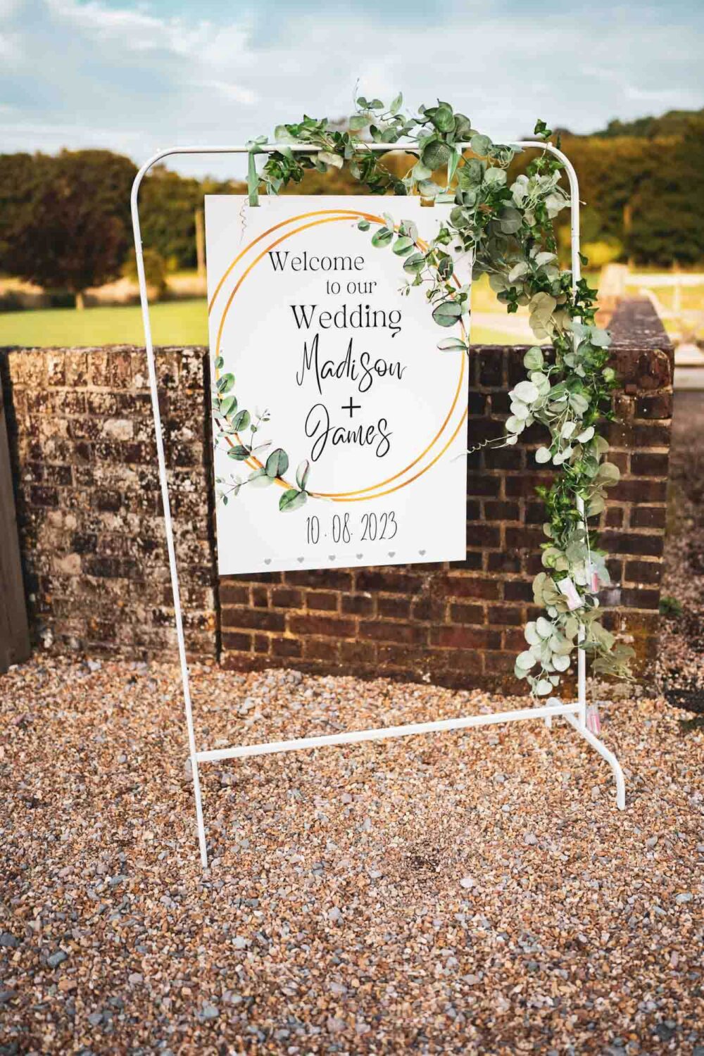 wedding sign saying names and date of wedding