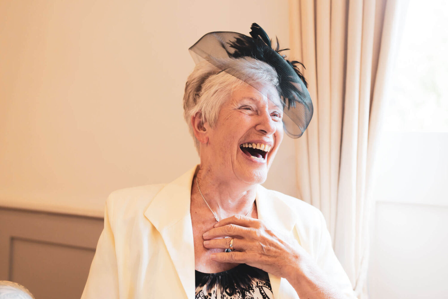 granny laughing loudly happily