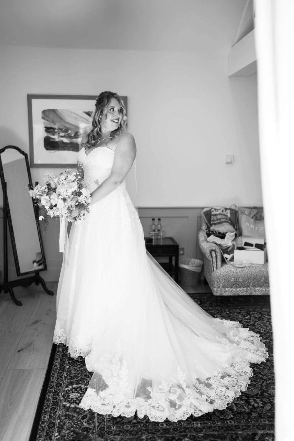 bride looking over her shoulder with wedding dress on