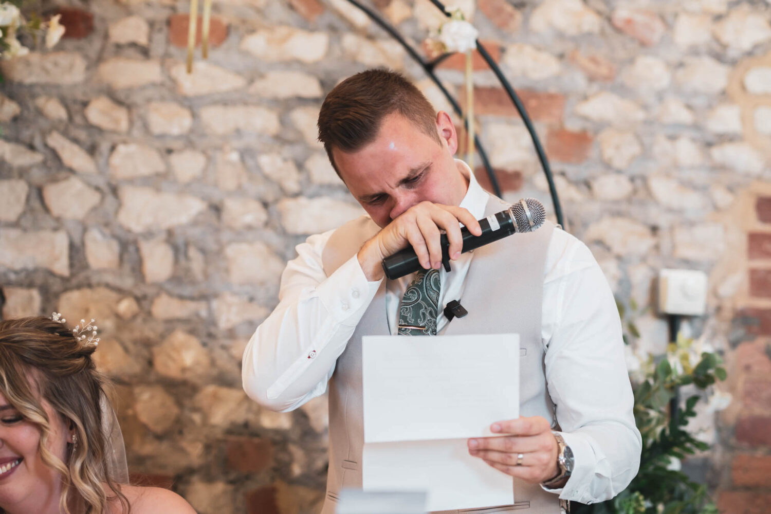 groom crying during wedding speech