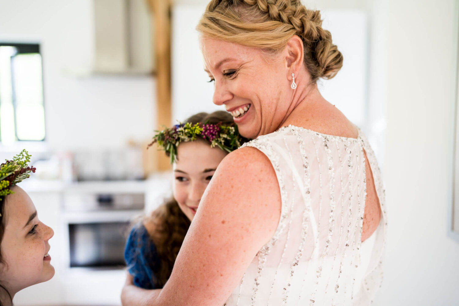 bride hugging daughter